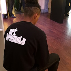 Application of the logo on a black hoodie
