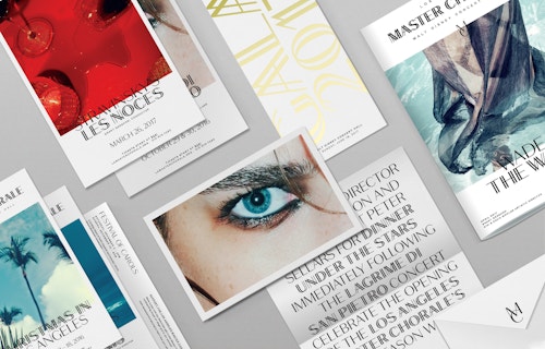 A set of printed materials designed for Los Angeles Master Chorale on a grey table