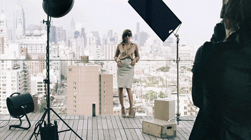 A model on a set of a shooting on a balcony