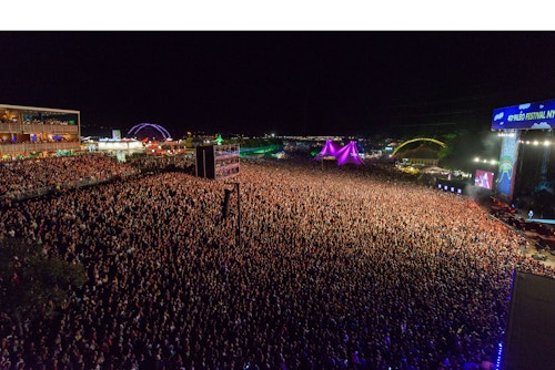 Large view of the crowd during the Paleo Festival at night